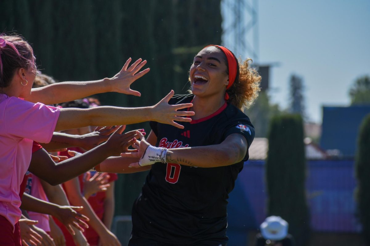 Fresno State goalkeeper Ashton Conley high fives her teammates prior to playing against Nevada at the Bulldog Soccer Stadium on October 13, 2024. 