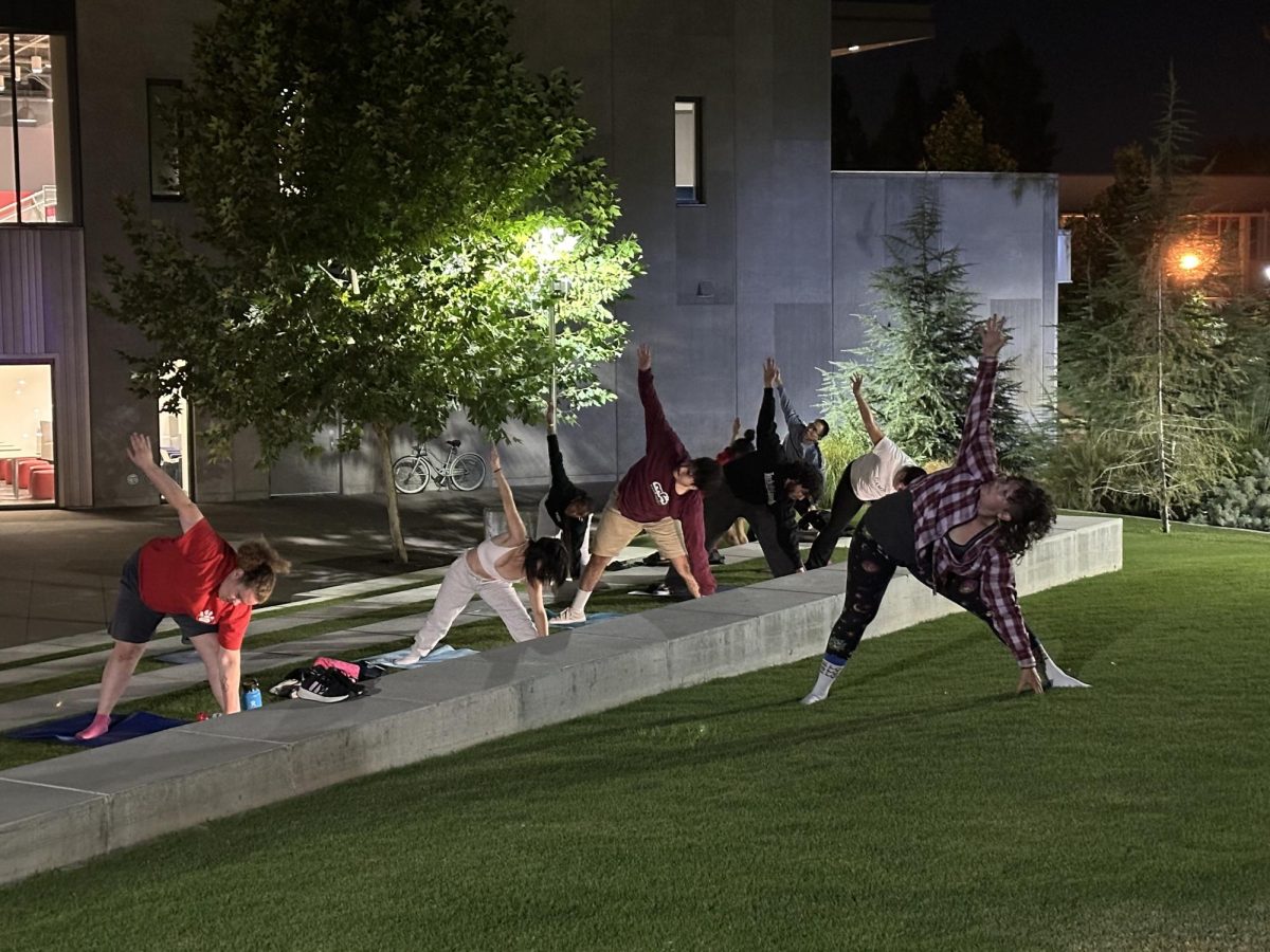 Gloria Doran leading attendees at the "Sunset Yoga with Gloria" session on Oct. 21, 2024.