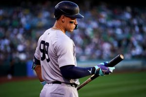 Aaron Judge (99) holding his bat in a game against the Athletics this season at the Oakland Coliseum.