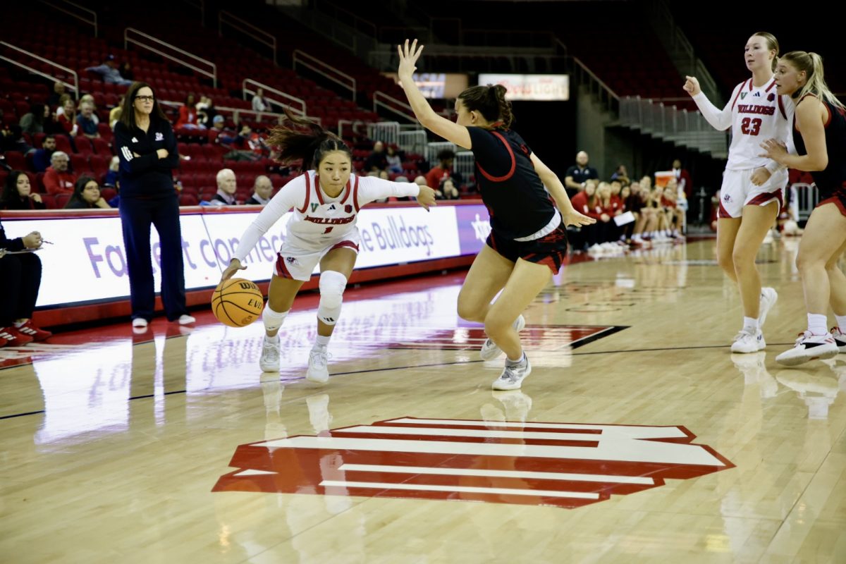 Taija Sta. Maria driving past a defender in Fresno State's 67-59 victory over Southern Utah University on Wednesday, November 13, 2024, at the Save Mart Center.