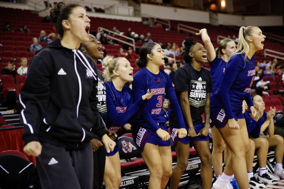 The Bulldog bench erupts to a big play in Fresno State's victory over UC Riverside on Nov. 11, 2024, at the Save Mart Center. 