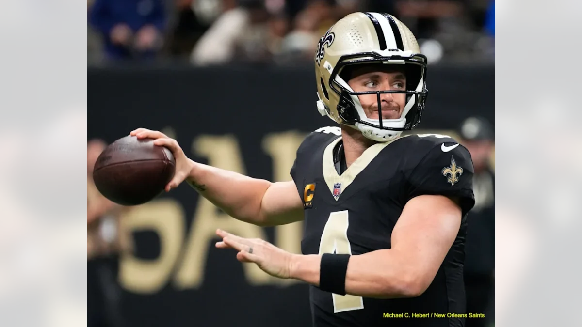 Derek Carr (4) warms up before the New Orleans Saints 35-14 victory over the Cleveland Browns on Sunday, Nov. 18, 2024. 