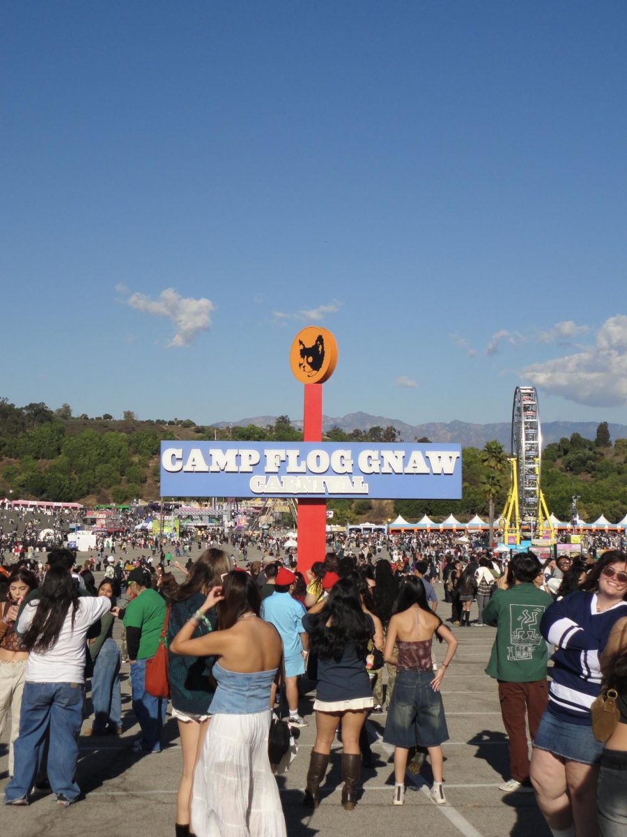 "Camp Flog Gnaw" sign near the entrance to the festival.