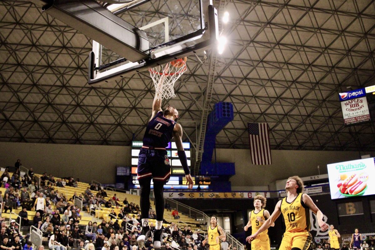 Guard Jasir Tremble jumps for a layup against California State University, Long Beach (CSULB) at Walter Pyramid on Nov. 23. 