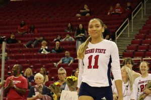 Senior middle blocker Kasey Purry (11) taking it all in her final game at the Save Mart Center. 