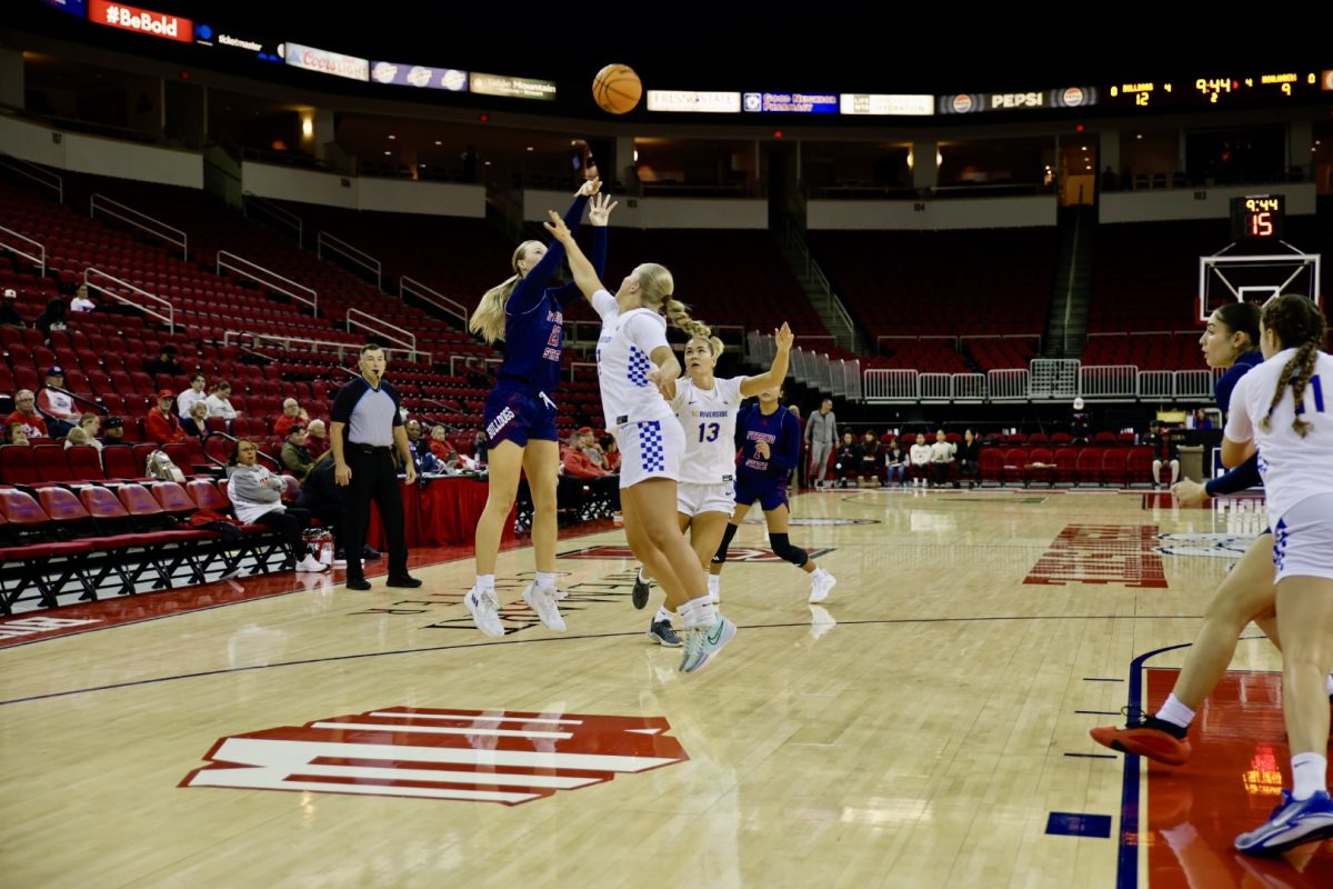 Fresno State forward Mia Jacobs shooting a three-pointer at the Save Mart Center before the Bulldogs defeated UC Riverside on Monday, Nov. 11, 2024.