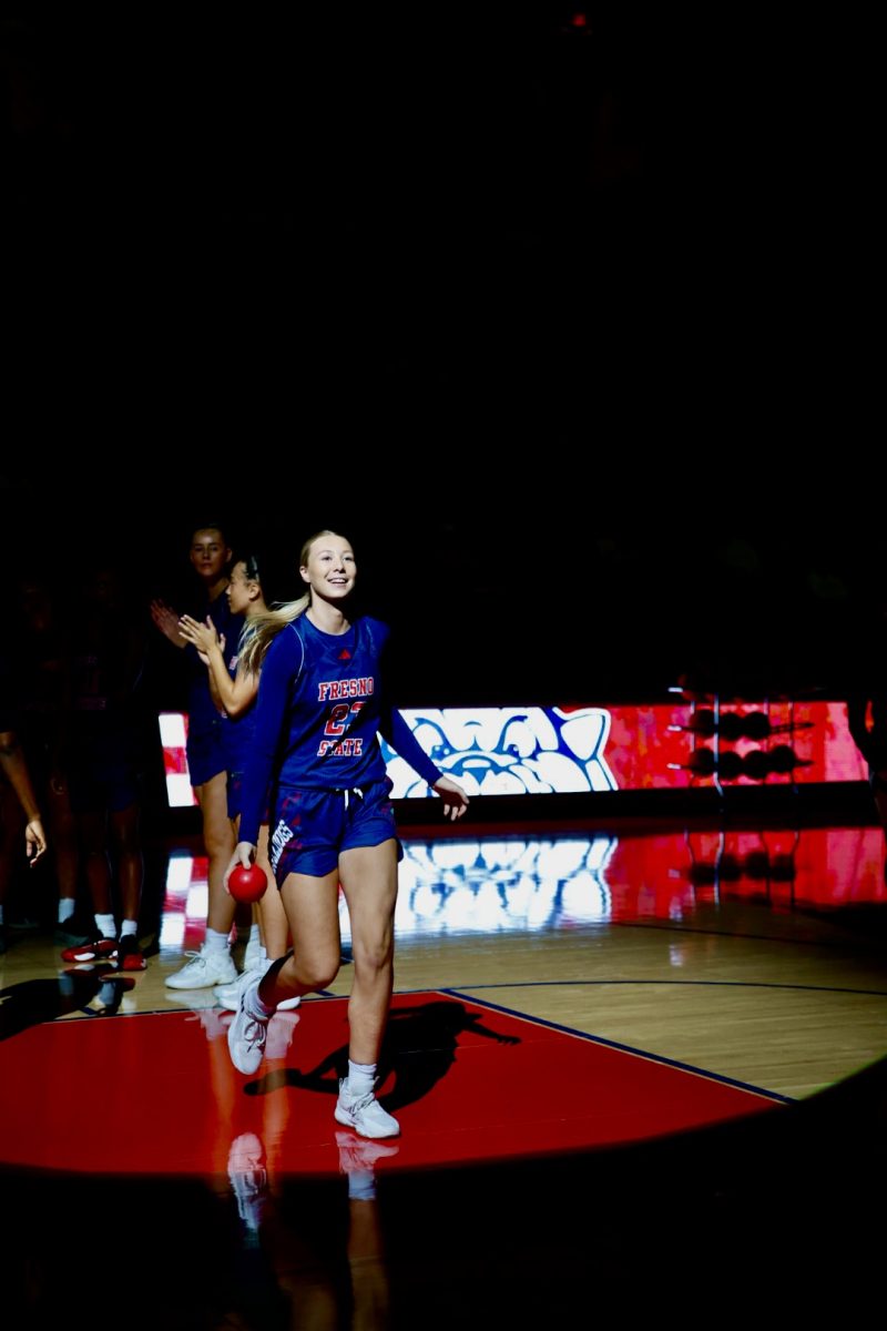 Mia Jacobs running out onto the court pregame at the Save Mart Center before Fresno State defeated UC Riverside on Monday, Nov. 11, 2024. 