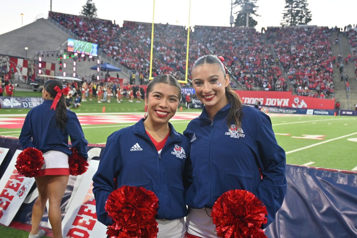 Fresno State cheerleaders Kiara Zurita and Rylie Bottimore at a Fresno State football game on Saturday, Nov. 2, 2024. 