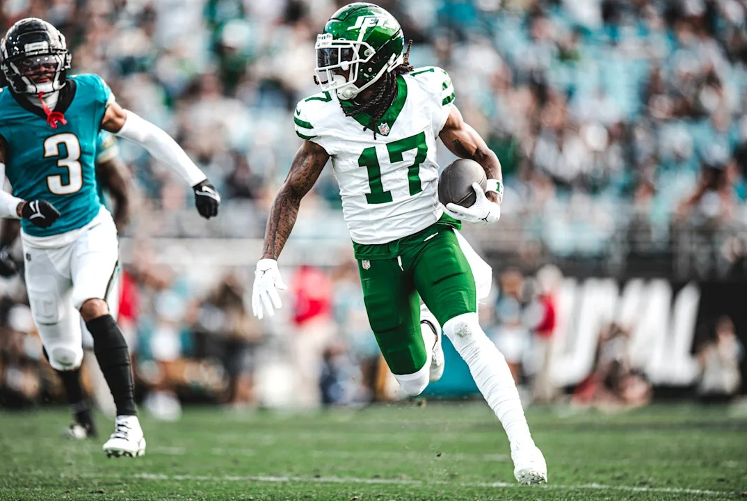 Davante Adams (17) runs past a Jacksonville defender late in the second half on Sunday, Dec. 15. 