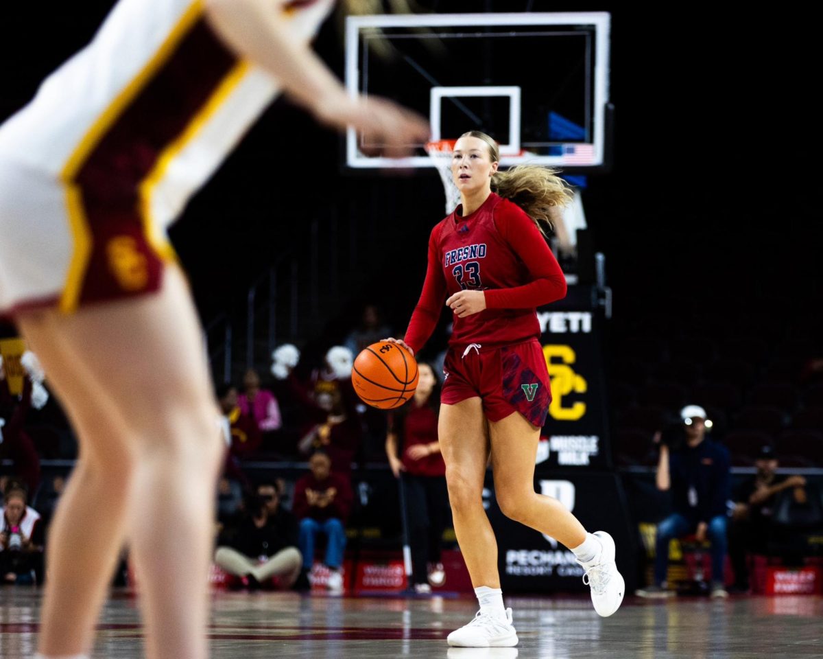 Mia Jacobs brings the ball up the court against USC at the Galen Center on Tuesday, Dec. 10, 2024. 