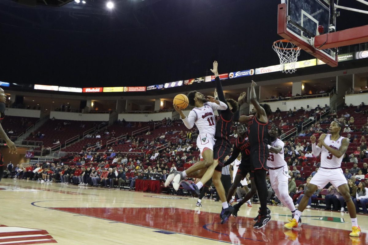 Mykell Robinson (11) goes in for a layup against San Diego State on Wednesday, Dec. 4, 2024, at the Save Mart Center. 