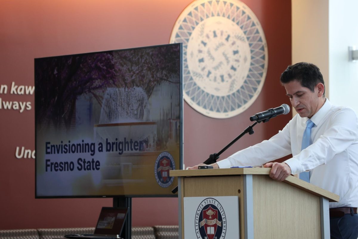 President Saúl Jiménez-Sandoval speaks at campus open forum about a proposed $495 student fee increase on March 6.