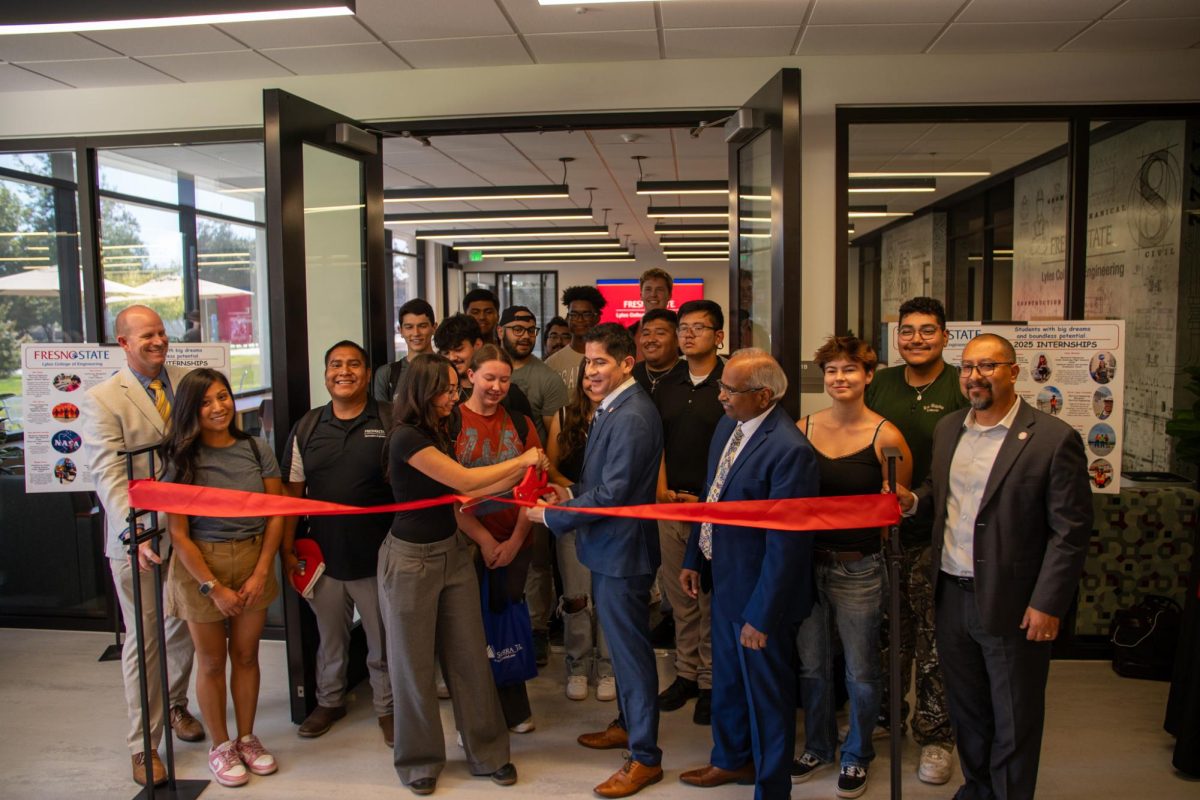 Fresno State campus leaders cut the ribbon to reveal the student center on Aug. 28.