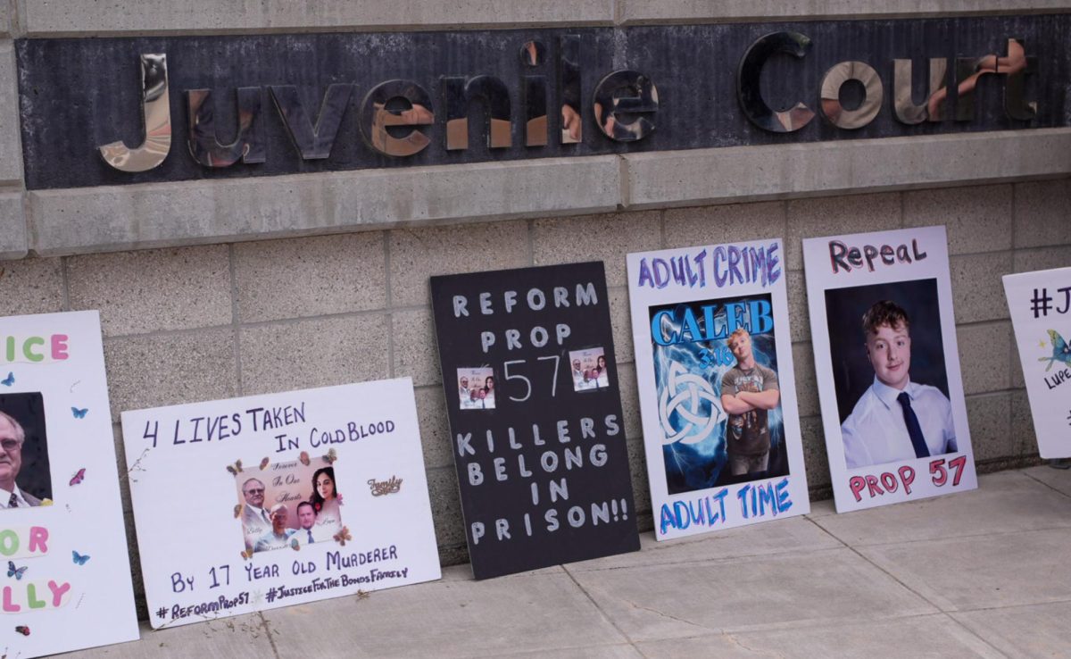 Posters at the protest in front of the Juvenile Justice Campus on Aug. 26.