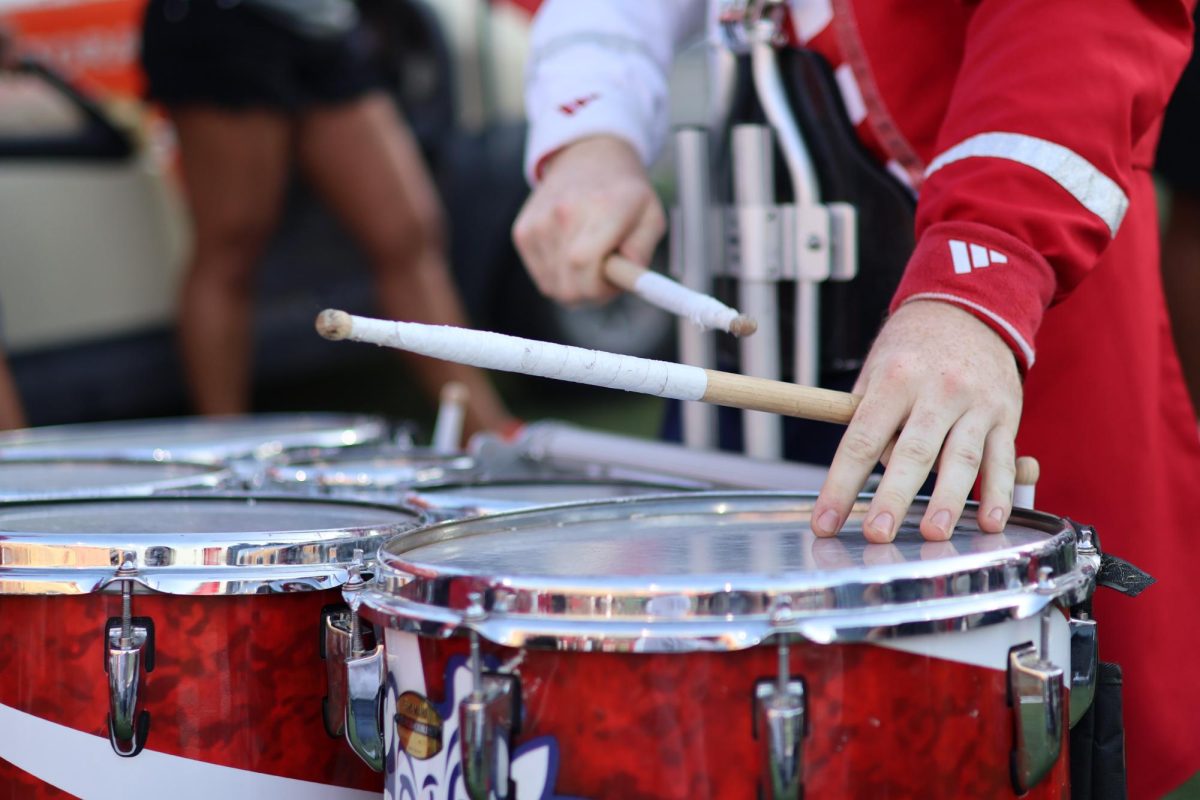 Bulldog Marching Band member plays the drums on Sept. 13 at Valley Children's Stadium.