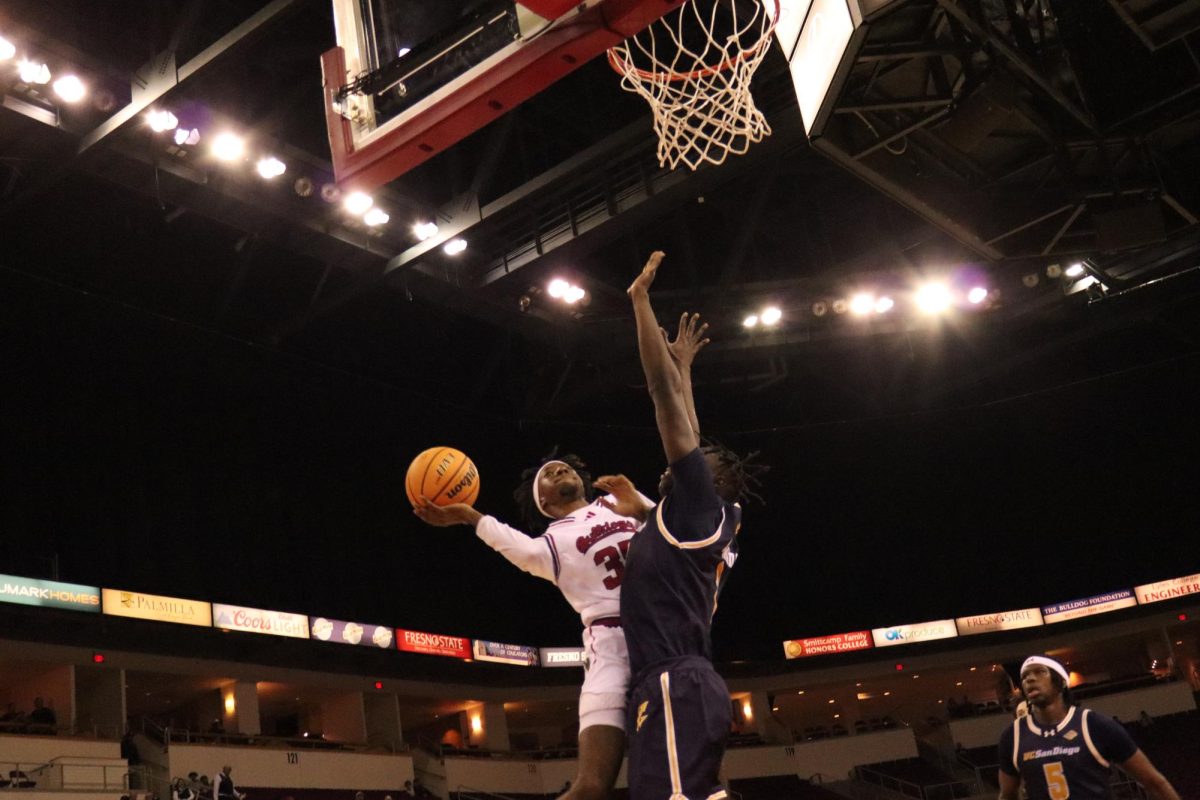DeShawn Gory converts an and-one against a Triton defender in the second half. 