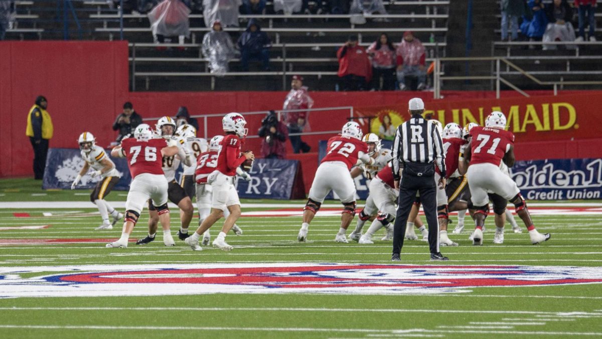 Fresno State quarterback Carson Conklin surveys the field against the Wyoming Cowboys at Valley Children's Stadium on Nov. 15.