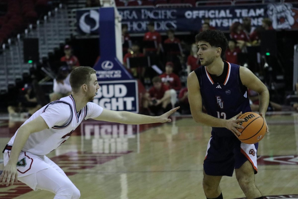 Bulldog guard Jake Heidbreder defends against a sunbird player