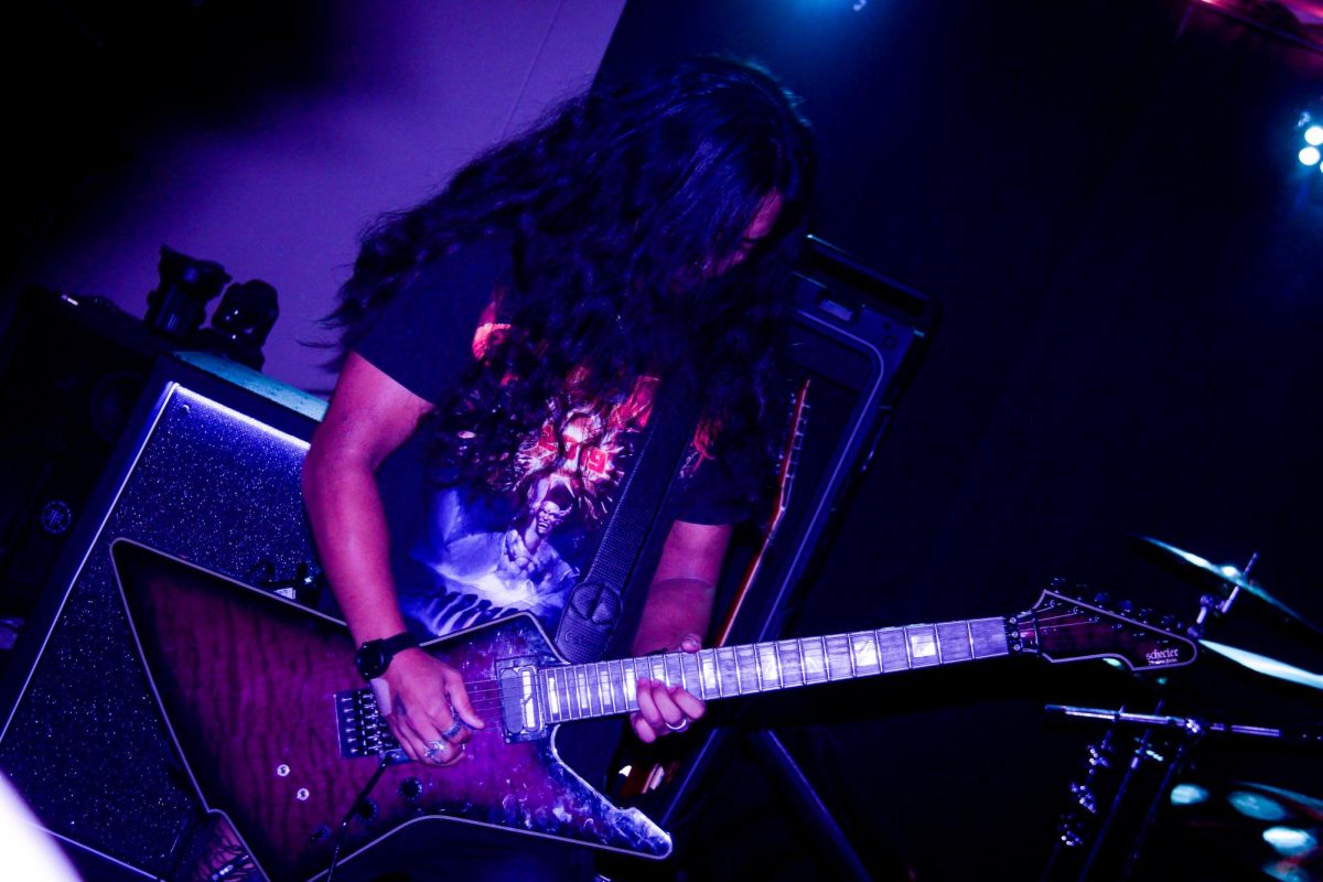 Guitarist Jonah Dacanay performs during Ozzy Osbourne tribute show.