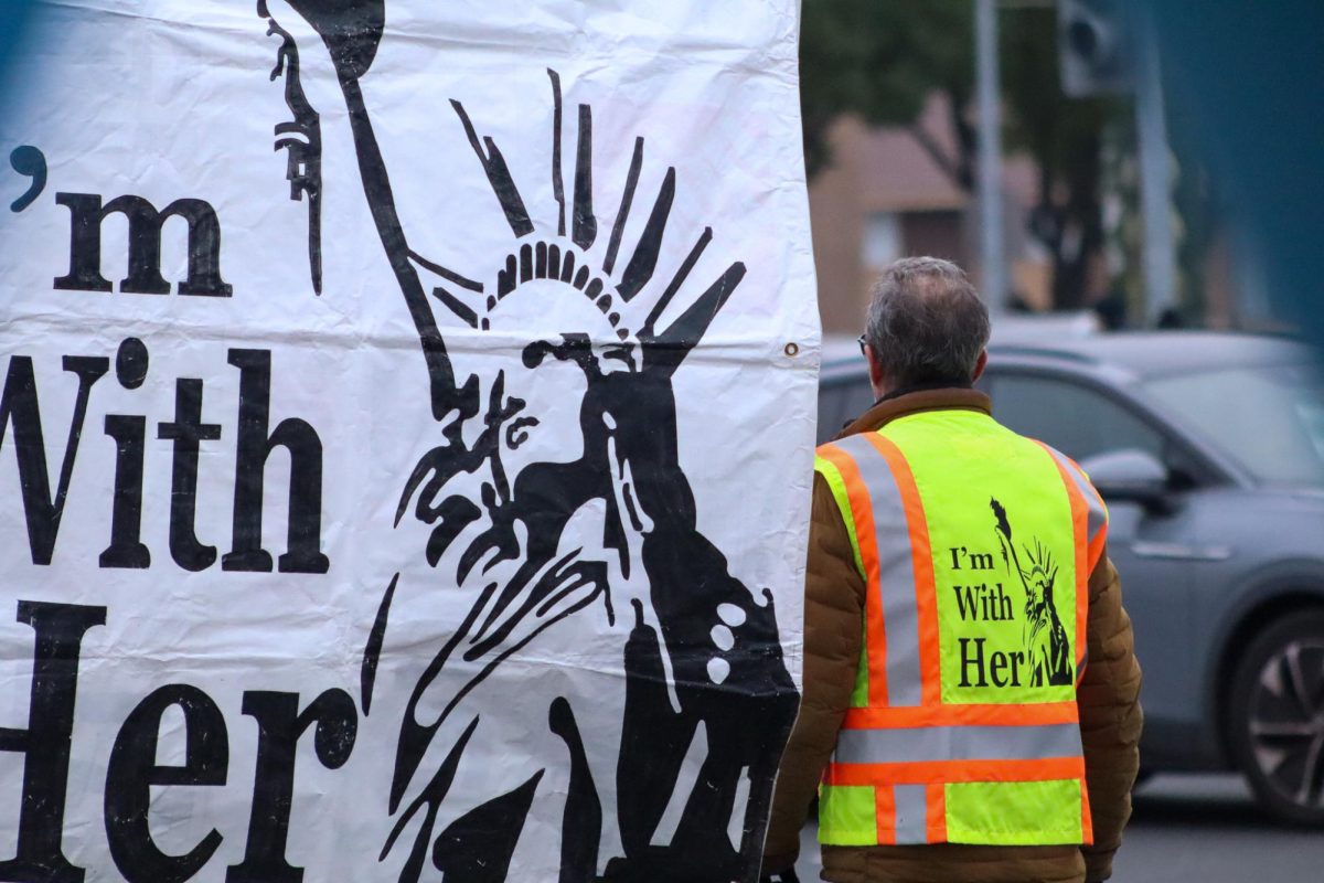 A protester attends a demonstration on Blackstone and Nees avenues on Dec. 6.