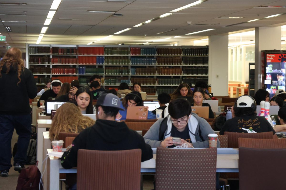 Students pack into the second floor of the Fresno State library on Dec. 17.