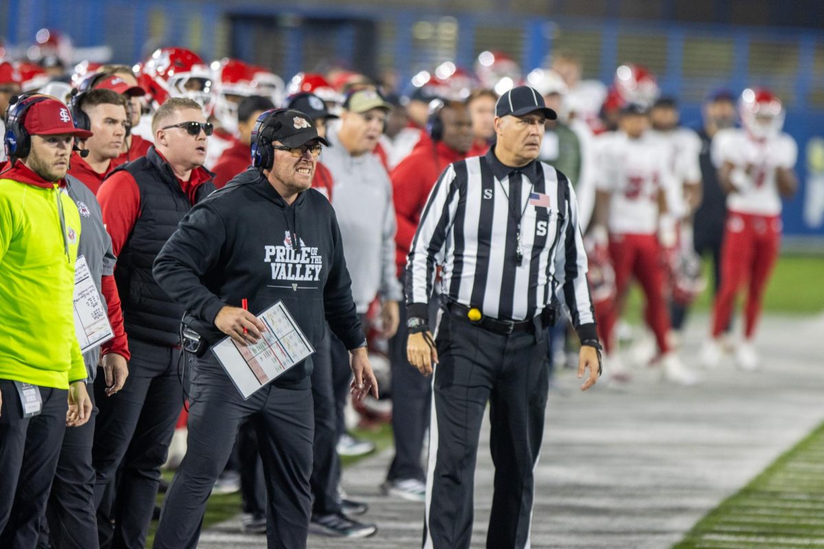 Fresno State football Head Coach Matt Entz stands on the sidelines of CEFCU Stadium as a play happens against the San Jose State Spartans on Nov. 29. Entz finished with nine wins in his first season as the head coach of the Bulldogs.