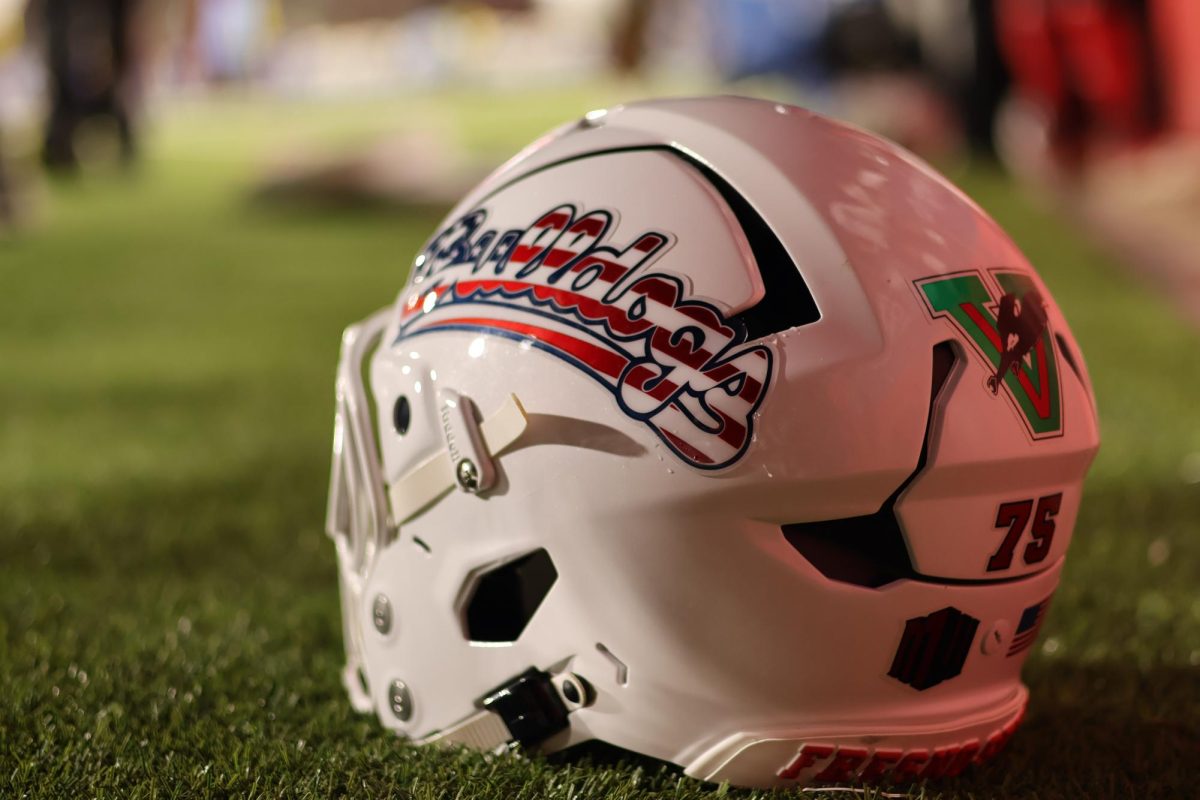 The Bulldogs' Heroes Night helmet lays on the turf of Valley Children's Stadium on Sept. 13, 2025.