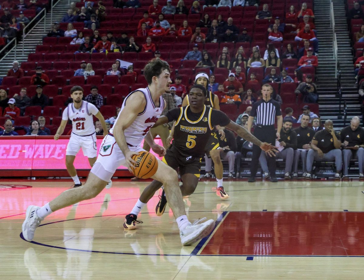 Forward Cameron Faas drives against a Wyoming defender during the 63-60 win against the Wyoming Cowboys at the Save Mart Center on Jan. 17.