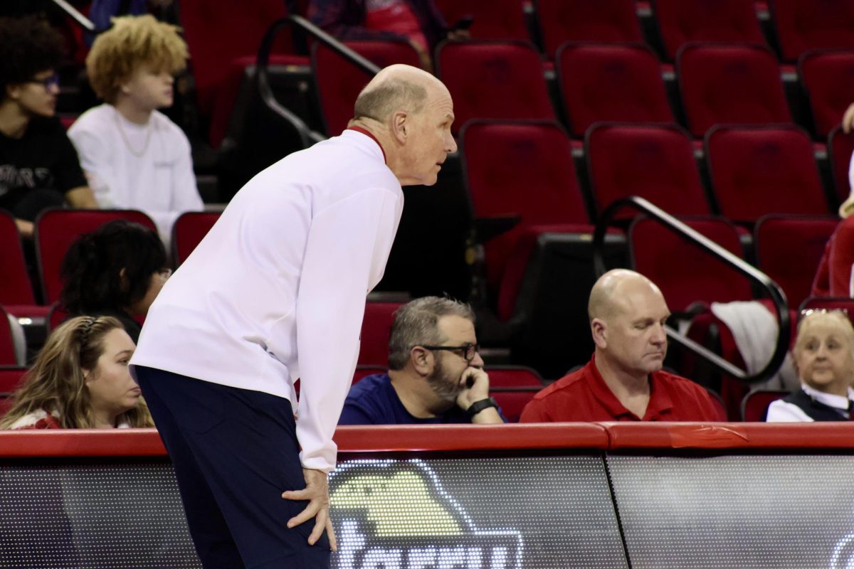 Bulldogs' Head Coach Vance Walberg stares down the court while his offense has the ball.