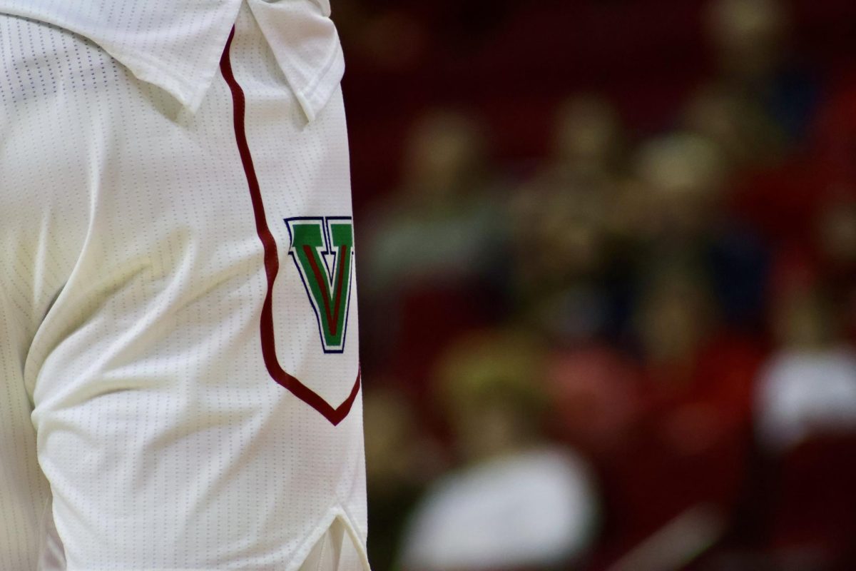 The shorts of a men's basketball player displaying the Green V on Jan. 3 at the Save Mart Center.