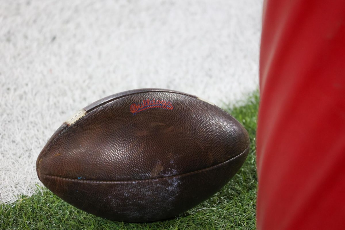 A football with the Bulldogs script logo lies at the base of the goal post at Valley Children's Stadium on Oct. 4, 2025.
