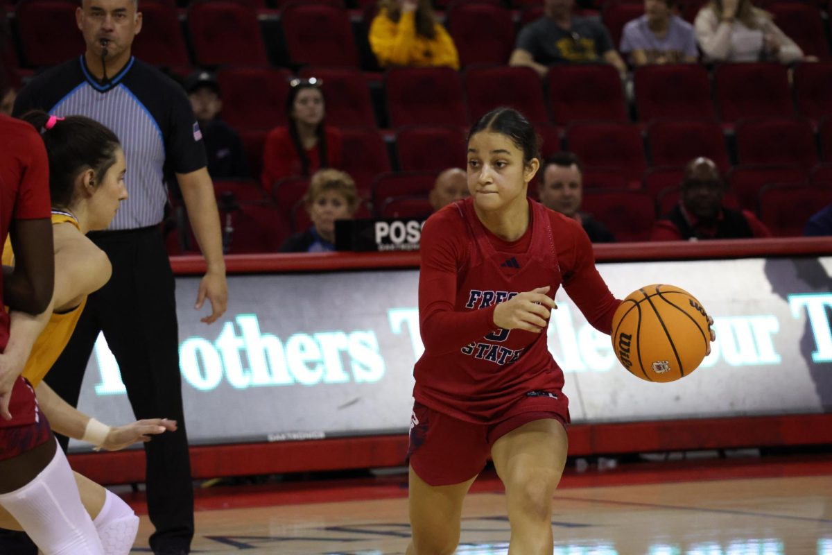 Bulldogs' guard Danae Powell drives to the basket against the Wyoming Cowgirls on Dec. 20, 2025 at the Save Mart Center. The 'Dogs picked up their first conference win of the season by beating the Cowgirls 53-36.