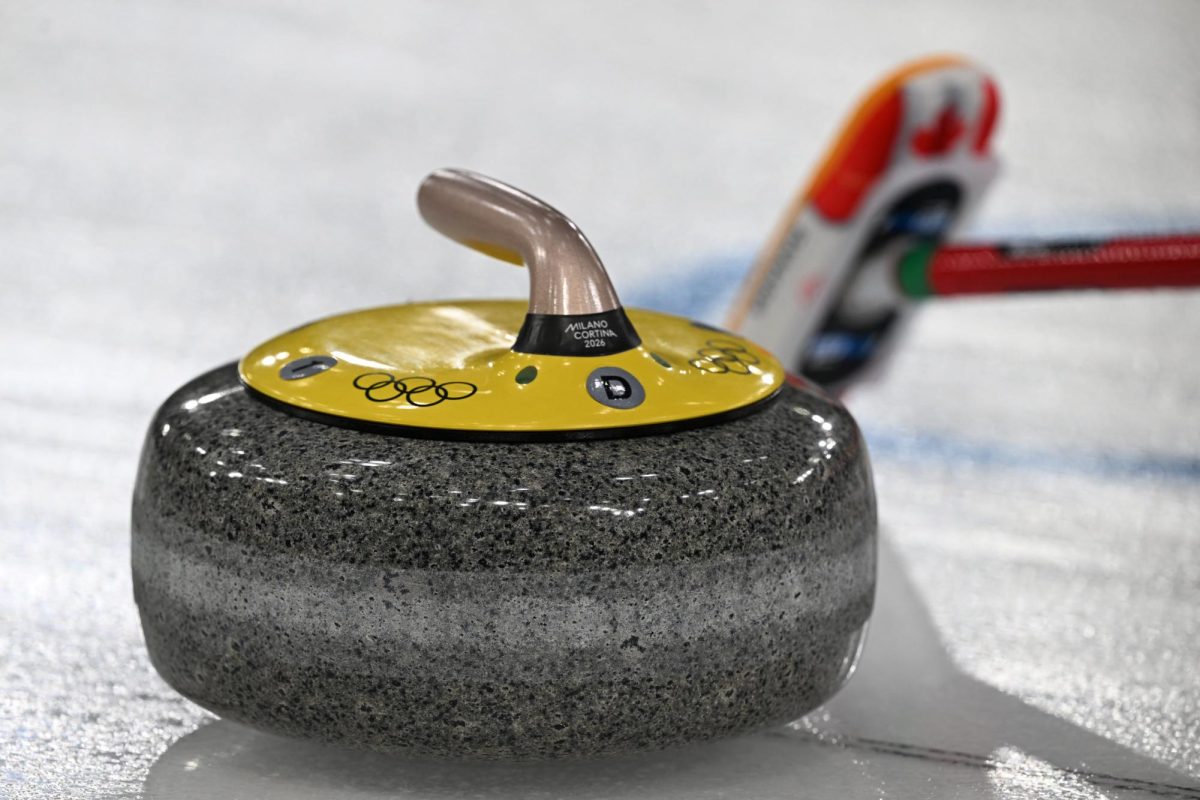 Milano Cortina 2026 Olympics - Curling - Men's Round Robin Session 4 - Canada vs Sweden - Cortina Curling Olympic Stadium, Cortina d'Ampezzo, Italy - February 13, 2026. General view of a stone on the ice during the match REUTERS/Jennifer Lorenzini