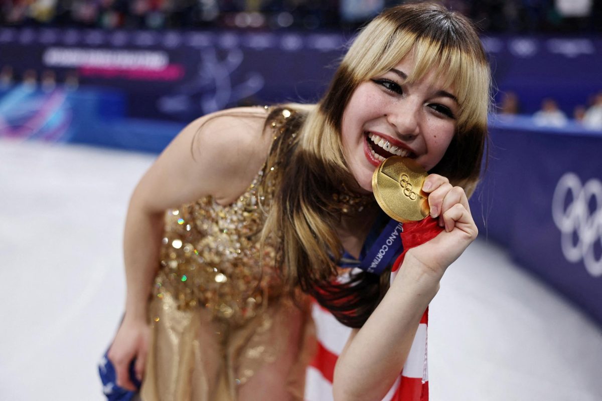 Milano Cortina 2026 Olympics - Figure Skating - Women Single Skating - Victory Ceremony - Milano Ice Skating Arena, Milan, Italy - February 19, 2026. Gold medallist Alysa Liu of United States celebrates after winning the Women Single Skating REUTERS/Amanda Pe