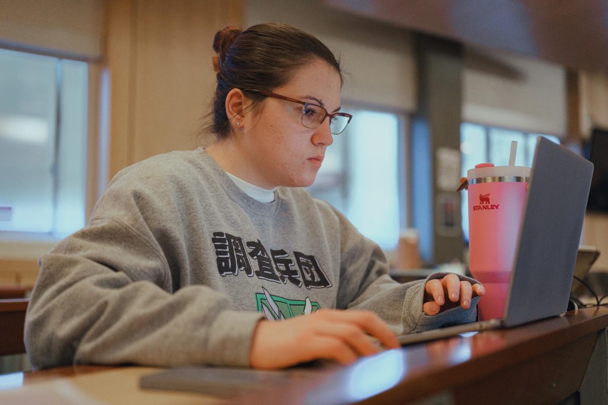 Emma studying during her class.