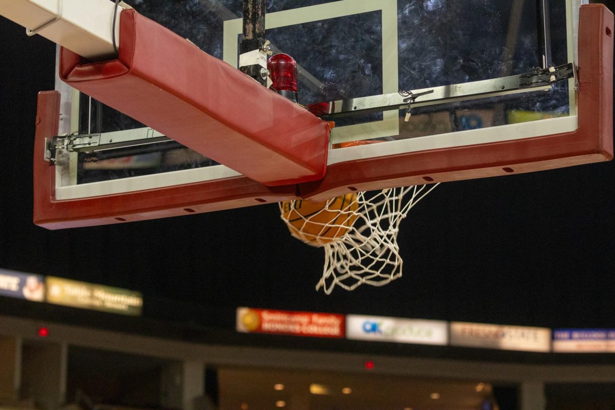 A basketball swishes into the hoop during halftime warmups during the men's basketball game against the Boise State Broncos on Feb. 28 at the Save Mart Center.