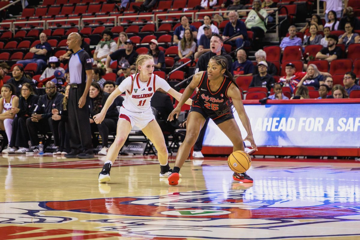 Fresno State guard Emilia Long plays defense against Lady Rebels guard Aaliyah Alexander during a game against the University of Nevada, Las Vegas on Feb. 28 at the Save Mart Center. Long led the 'Dogs with a 14-point double-double in the 68-54 loss on Senior Night.