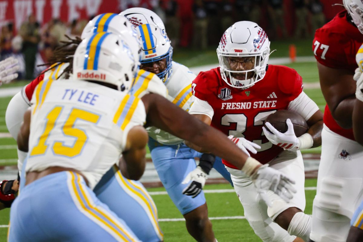 Bulldogs' running back Elijah Gilliam runs between the tackles against the Southern University Jaguars on Sept. 13.