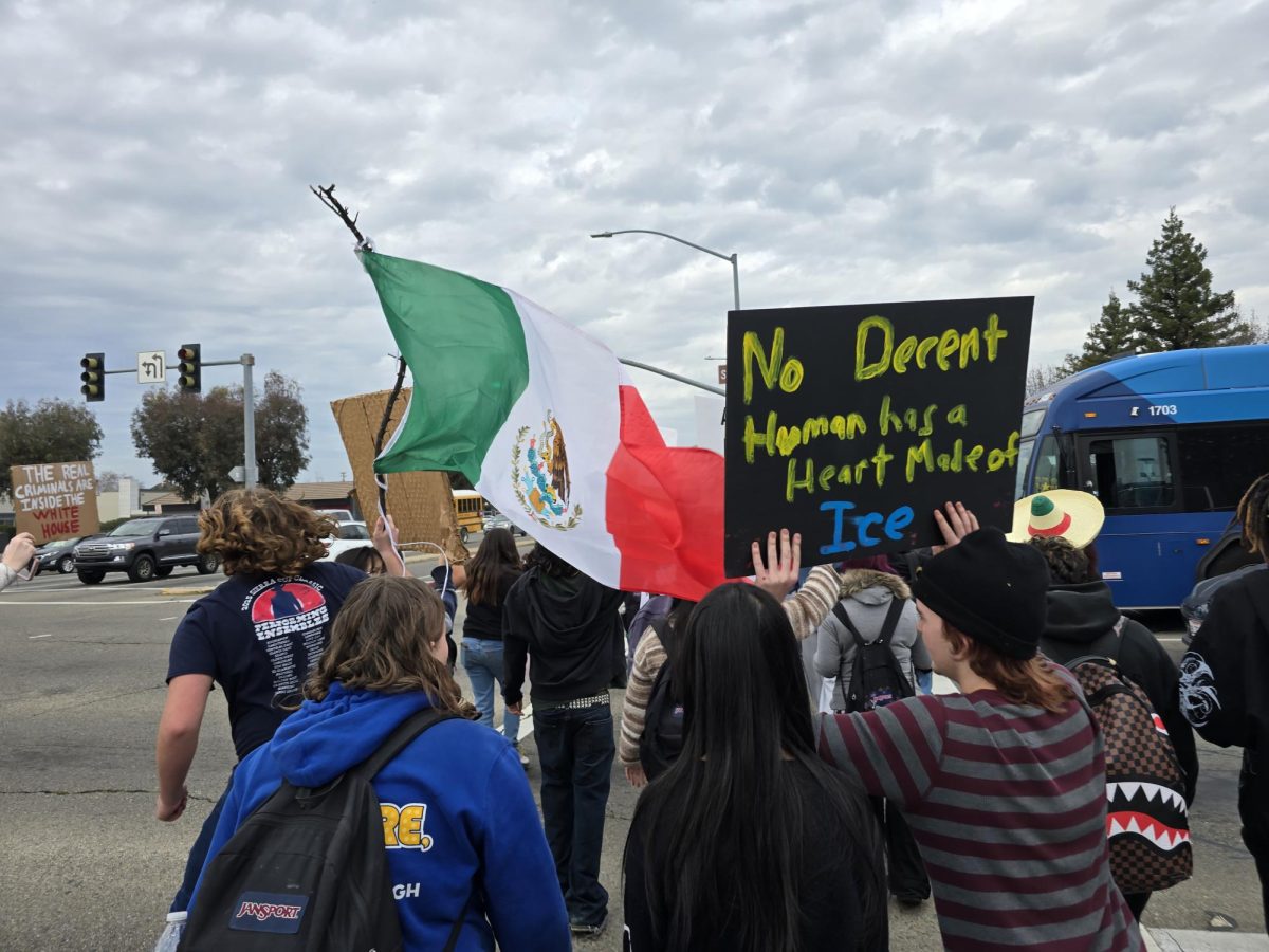 Clovis school students protest on Shaw and Clovis avenues after walking out of their schools on Feb. 10.