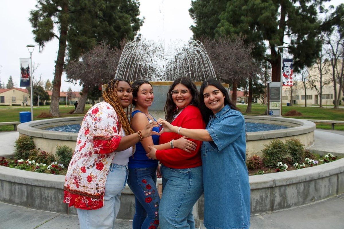 Four women pose for I Heart Fresno State Week.