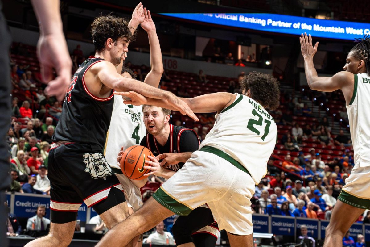 Fresno State guard Jake Heidbreder drives into a crowded paint during the first round matchup against the Colorado State Rams in the Mountain West Tournament at the Thomas & Mack Center on March 11.