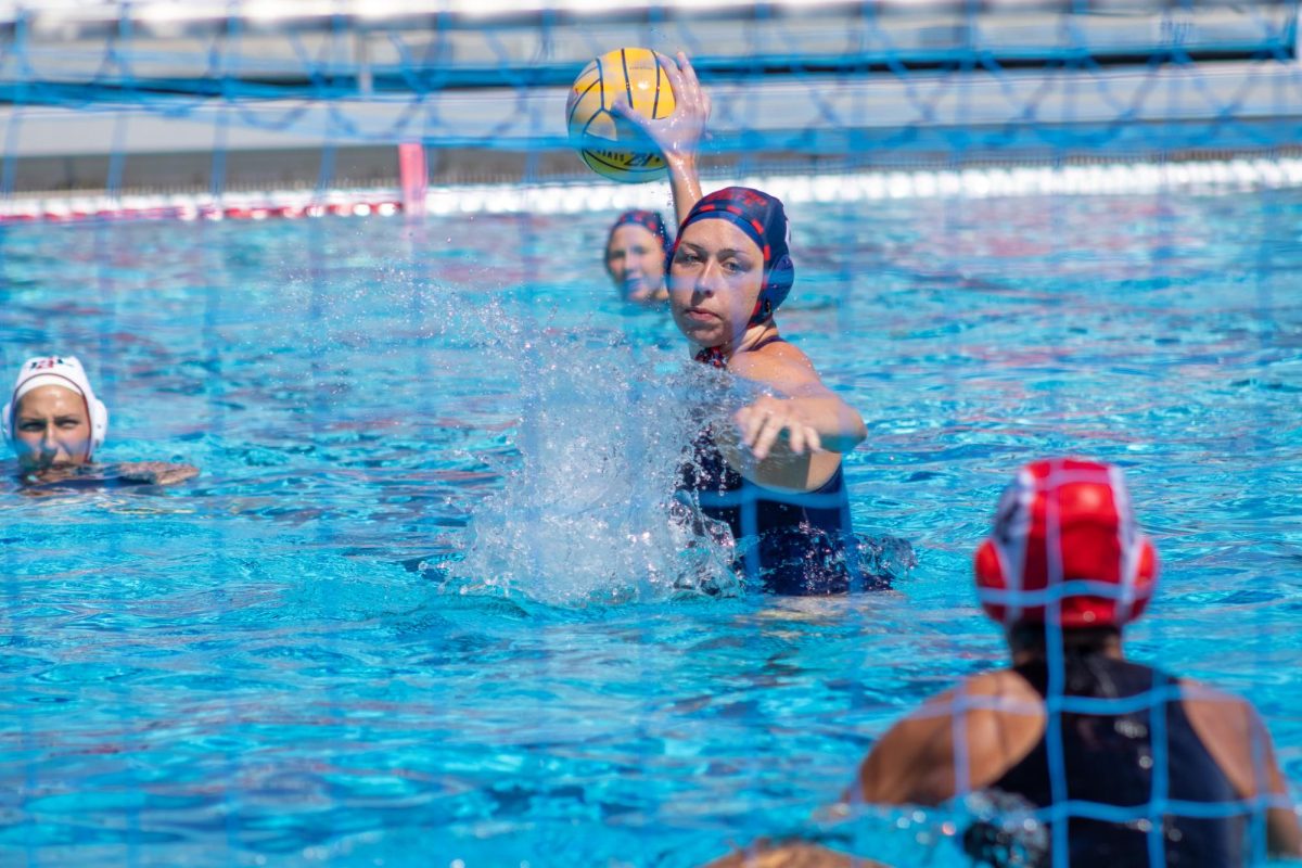 Fresno State water polo attacker Hailey Andress whips a 5-meter penalty shot against the San Diego State Aztecs on March 22 at the Fresno State Aquatics Center. Andress led the Bulldogs with four goals, as they took down the Aztecs 14-12. 