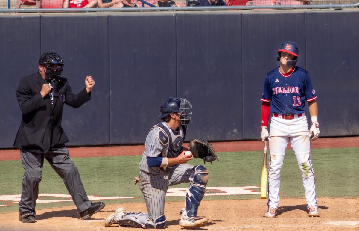 Fresno State baseball catcher Ryan De La Maza stands in the batters box as he strikes out looking against the Nevada Wolf Pack on March 15 at Bob Bennett Stadium.