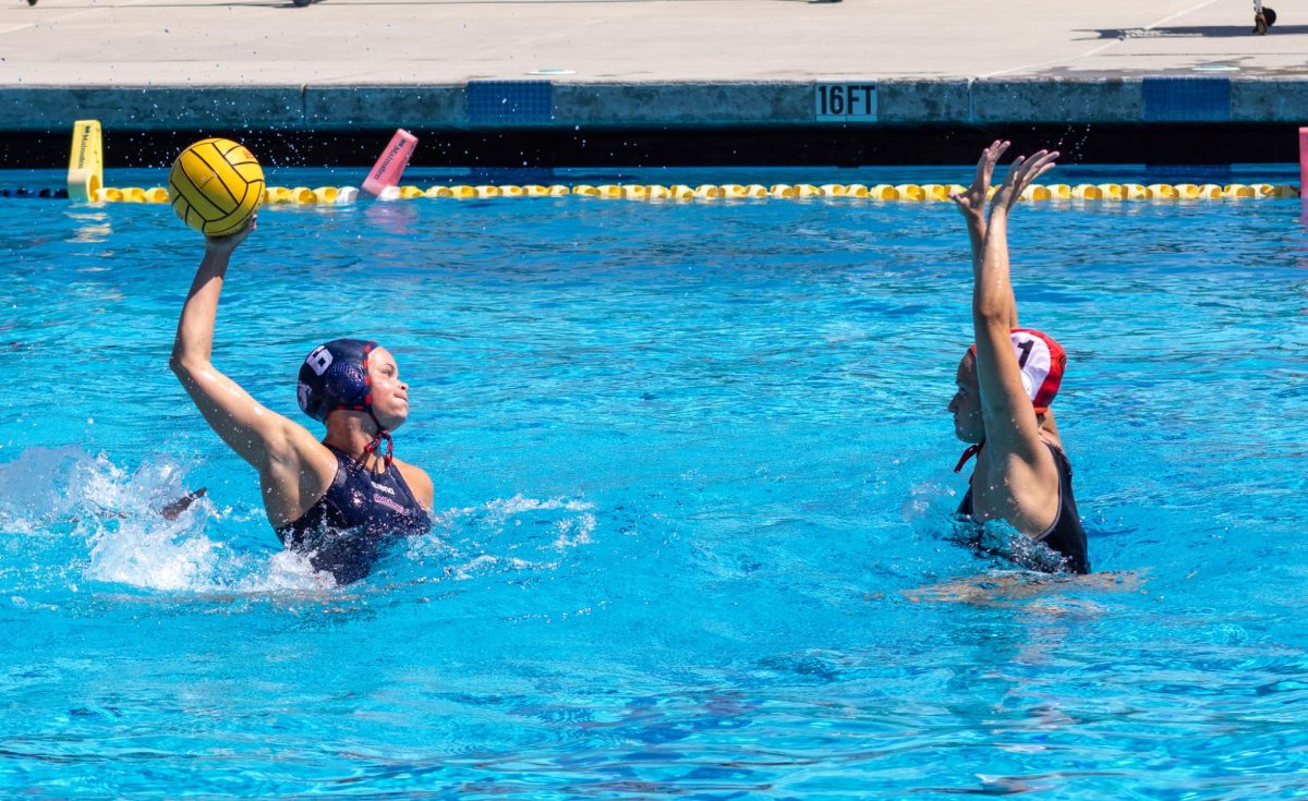 Fresno State water polo freshman attacker Charley Stephens raises to shoot on a breakaway against the Pacific Tigers on March 28 at the Fresno State Aquatics Center. Stephens and freshman Riaan Bryant accounted for nine of the Bulldogs' 13 goals against the Tigers for a senior day victory.
