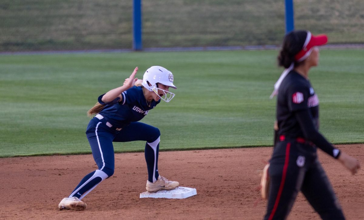 An Aggie celebrates after hitting a double during the Aggies' four-run rally in the top of the 3rd inning