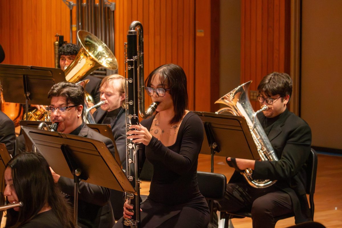 Isabella Battad plays the contra-bass clarinet in Phillip Sparke’s “Sunrise at Angel’s Gate.”