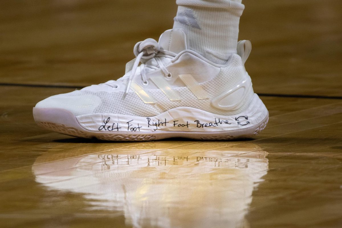 Morelia Chavez's shoes with the words "Left foot right foot breathe" written on them.