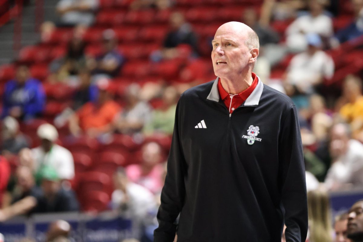 Head Coach Vance Walberg watches his team play the Colorado State Rams during round one of the Mountain West Tournament at the Thomas & Mack Center on March 11. 