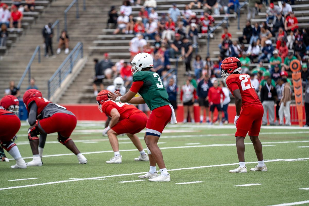 Fresno State football quarterback Khristian Martin takes a snap during the Fresno State Spring Showcase on April 25 at Valley Children's Stadium.