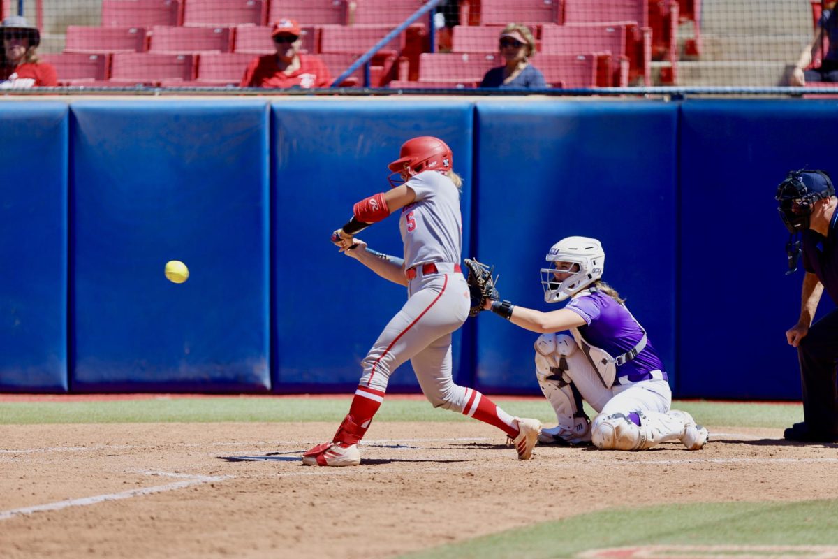 Sophomore catcher Rylee Bocchini swings at a pitch during the first game of a doubleheader against the No. 25 Grand Canyon University Lopes at Margie Wright Diamond on April 8. Bocchini went 5-for-6 with a double over the two games.